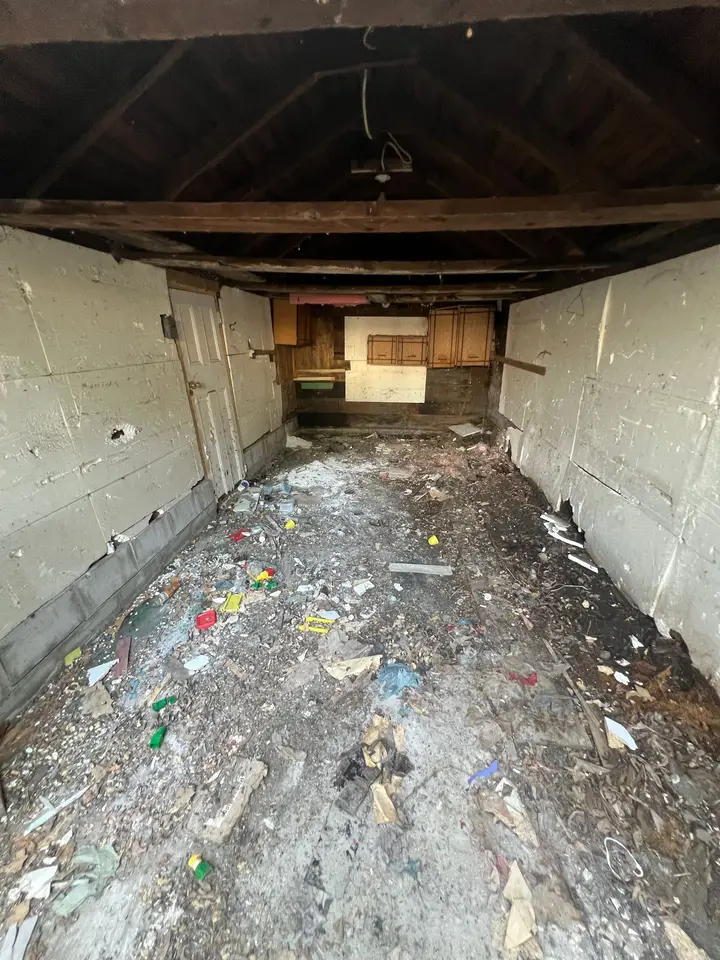 The same garage emptied down to the bare floor